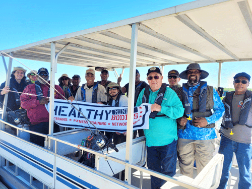 Healthy Minds Healthy Bodies group members on a pontoon boat