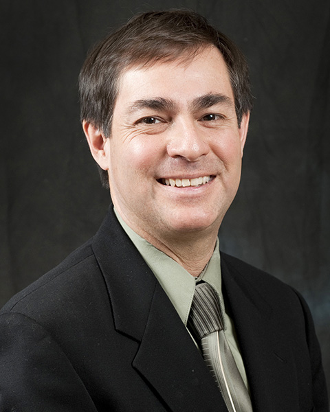 Headshot photo of Anthony Nolan