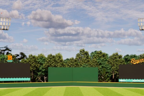 A picture of bowie baysox field. It is a baseball field, the sky is blue and the grass is green