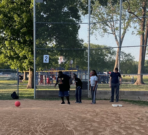 participants playing kick ball