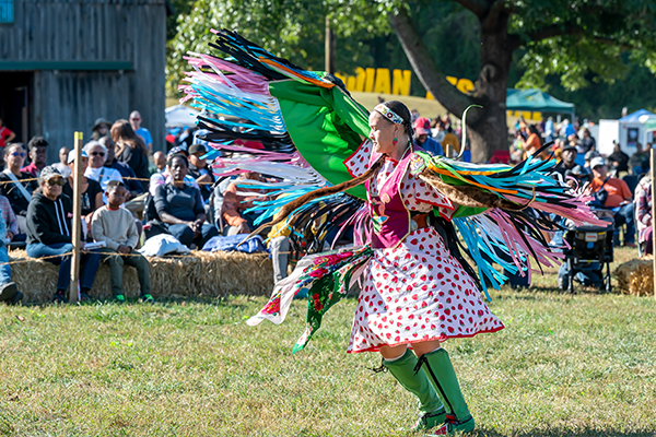 A performer doing a traditional Native American Dance