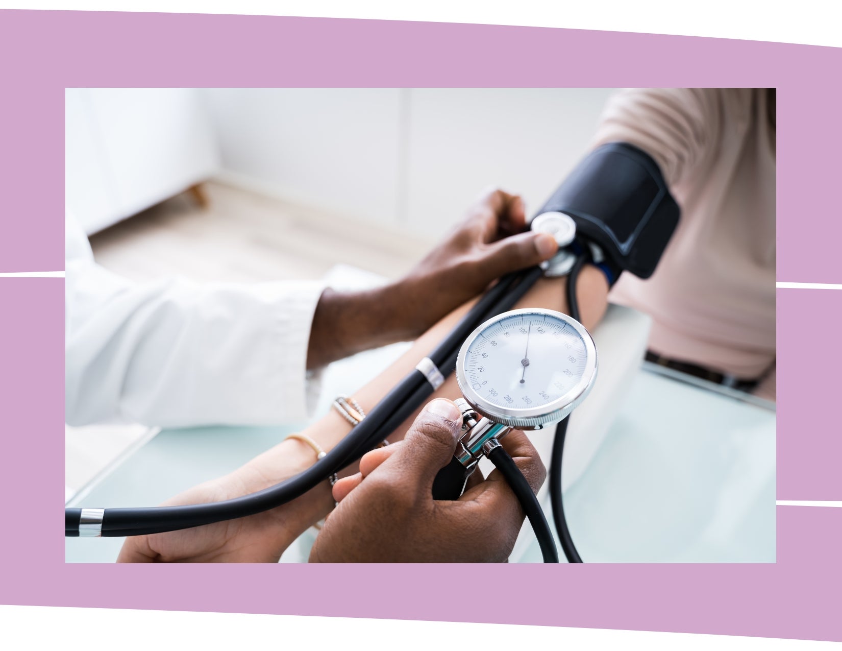Close-up view of a doctor using a blood pressure cuff with an attached gauge to measure a patient's blood pressure.